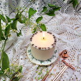 Beauty Scents large coffee candle lit showing clean flame with coffee bean topping and copper snuffer