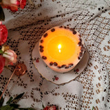 Beauty Scents large coffee candle lit showing even burn and coffee bean decoration with red roses