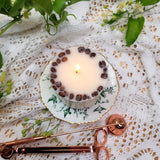 Coffee candle large lit showing perfect burn with coffee bean decoration