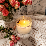 Large heart-shaped coffee bean candle burning for 5 hours showing flame and wax pool