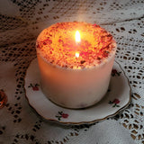 Beauty Scents large rose petals candle lit showing glowing flame through dried rose petals with fresh roses