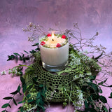 Large glass raspberry candle profile view with red wax berry decorations - available in 4 scents