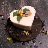 Large heart lemon candle in home interior setting showing romantic heart shape and decorative appeal