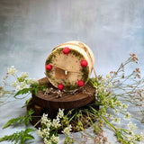 Large raspberry candle alternative angle displaying red wax berries and handmade quality