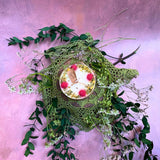 Small raspberry candle alternative view highlighting red wax berry decorative elements
