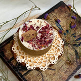 Beauty Scents small rose petals scented candle with natural botanical decoration on rustic wooden base