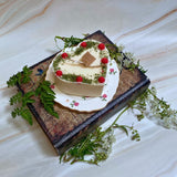 Large heart raspberry candle profile view with red wax berry decorations - available in 4 scents