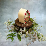 Large heart raspberry candle alternative view highlighting red wax berry decorative elements