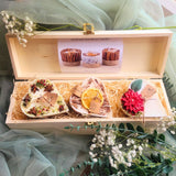 3 Hearts Winter Gift Set elegant wooden wine box presentation with natural wood shavings and romantic heart-shaped candles