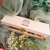 3 Hearts Winter Gift Set close-up view of heart-shaped candles with detailed winter botanical decorations in wooden box