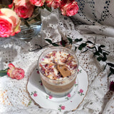 Beauty Scents large glass jar candle decorated with dried rose petals and twine bow on elegant vintage china with romantic styling