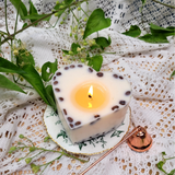 Large heart coffee bean candle side angle showing natural coffee beans pattern