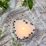 Large heart coffee bean candle burning with flame and romantic coffee bean decoration