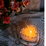 Large heart coffee bean candle lifestyle shot with natural lighting and heart shape