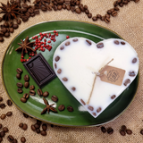 Close-up detail of large heart coffee bean candle showing coffee beans in wax