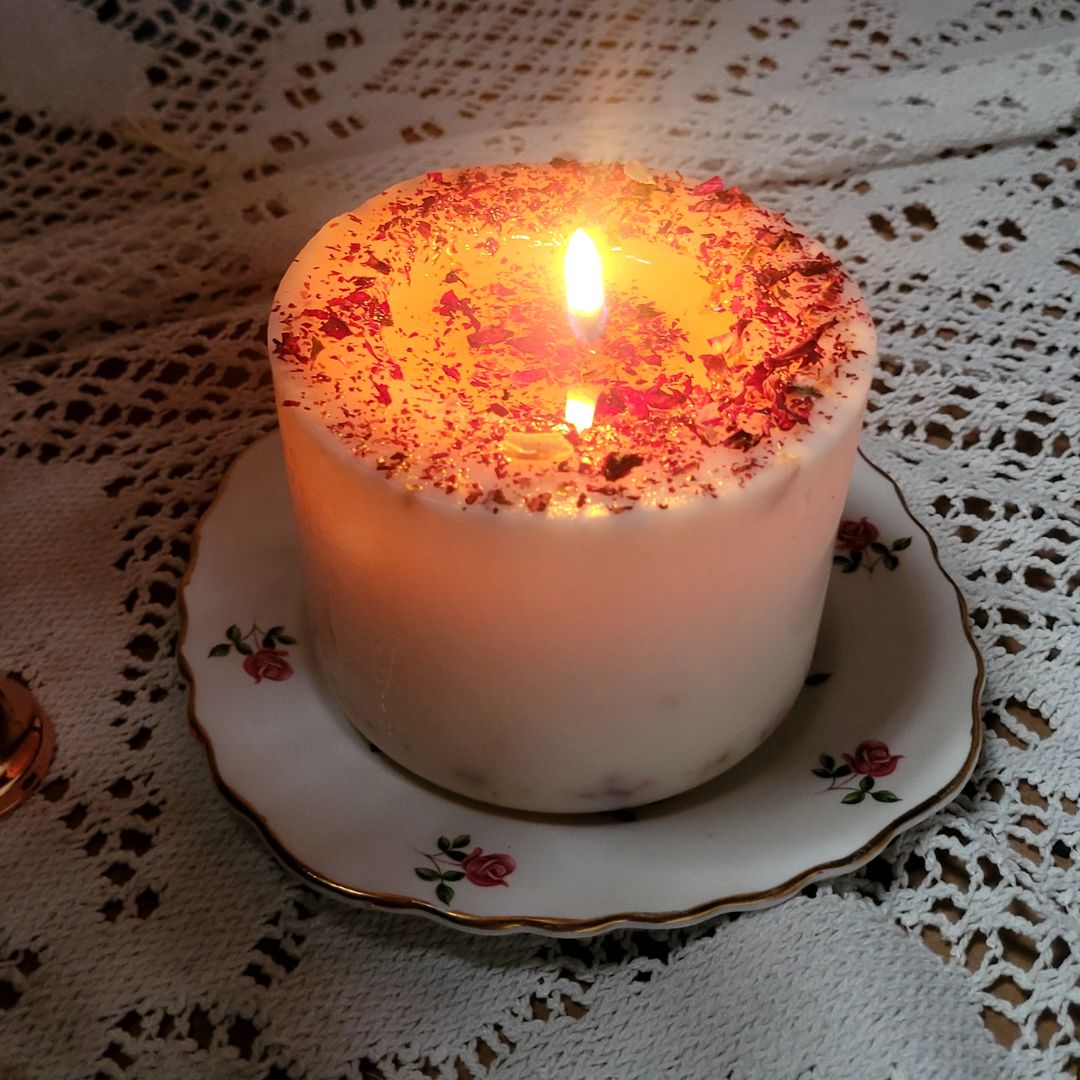 Beauty Scents large rose petals candle lit showing glowing flame through dried rose petals with fresh roses