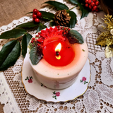 Large Winter Poinsettia pillar candle main product image with red poinsettia flowers on white soy wax