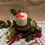 Large Winter Poinsettia candle top view showing white wax surface with red poinsettia flower arrangement