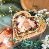 Large heart mulled wine candle in romantic wooden heart gift box showing premium winter gift packaging