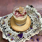 Beauty Scents large glass rose petals candle with natural botanical decoration on rustic wooden plate with vintage styling