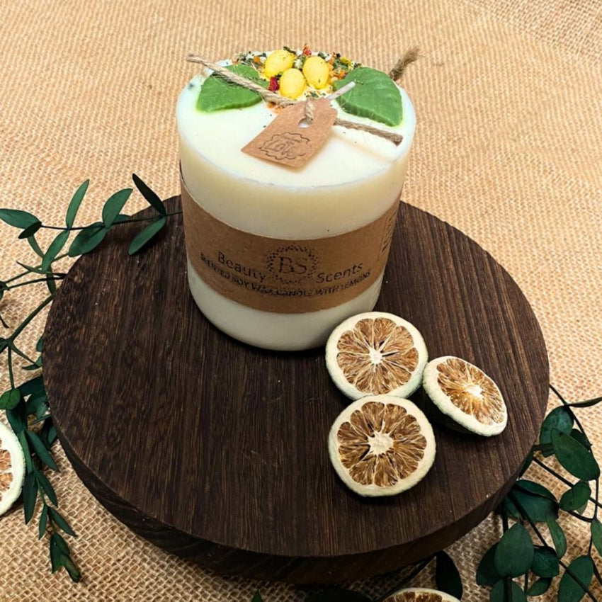 Large lemon pillar candle lifestyle view showing citrus-scented candle in modern home décor