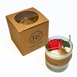 Large glass Winter Poinsettia candle with Hollyberry scent featuring red poinsettia flowers and green leaves