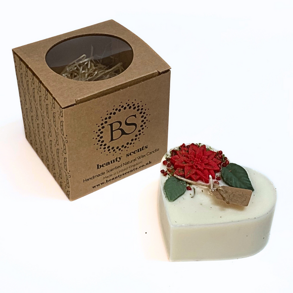 Large heart Winter Poinsettia candle with Hollyberry scent featuring red poinsettia flowers and green leaves