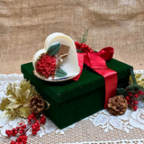 Large heart Winter Poinsettia candle side view showing white wax with festive botanical decoration