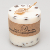 Medium coffee bean candle with natural coffee beans decoration on grey background