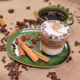Side view of medium coffee bean candle showing natural coffee beans embedded in wax