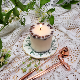 Medium coffee bean candle burning with flame and coffee bean decoration