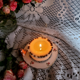 Medium low coffee bean candle burning progress showing wax pool formation