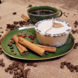Medium low coffee bean candle angle view with coffee beans decoration