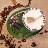 Side view of medium low coffee bean candle showing natural coffee beans embedded in wax