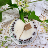 Medium low coffee bean candle lifestyle shot showing handcrafted coffee bean decoration