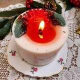 Medium Winter Poinsettia candle side angle displaying handcrafted botanical decoration details
