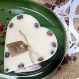 Small heart coffee bean candle burning with flame and romantic coffee bean decoration