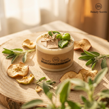 Beauty Scents small apple candle on a wooden surface with leaves and apples