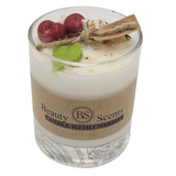 Small soy candle in a clear glass jar with wax cherries and green leaf decoration, with tag and ‘Candle with Cherries’ label, on a white background.