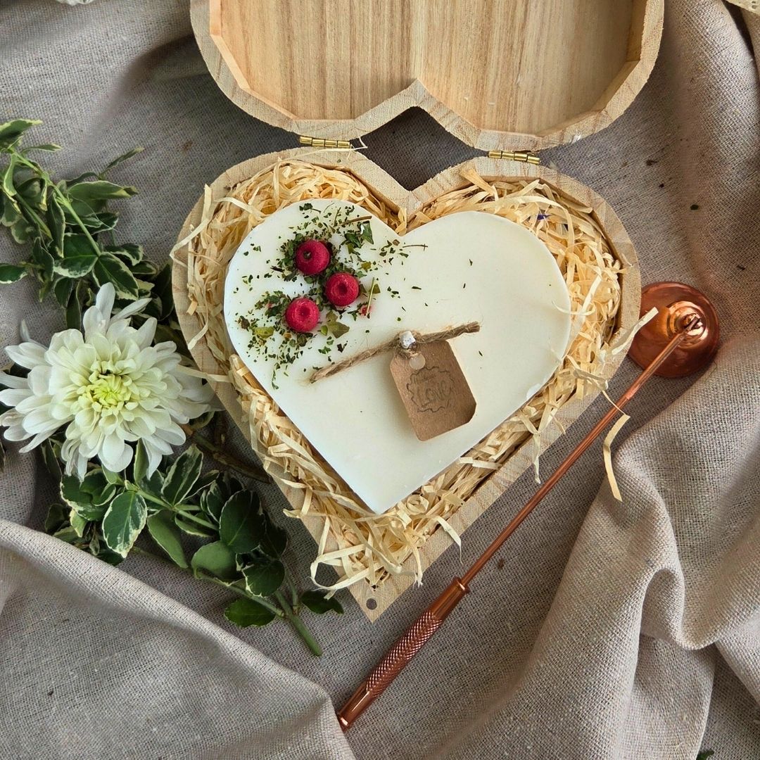 Wooden heart box with handmade candle and red berry decoration