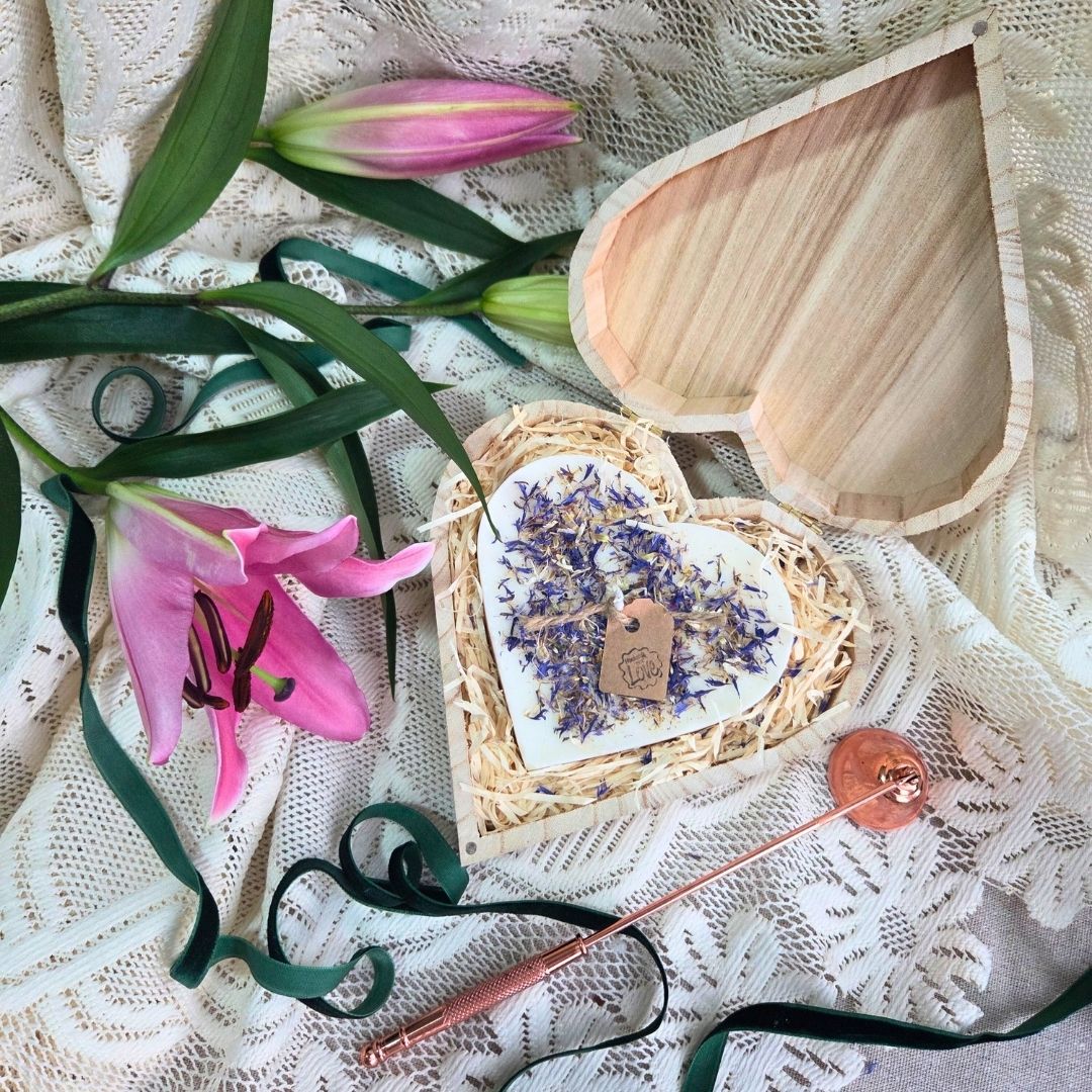 Wooden heart box with handmade candle and wild flower decoration